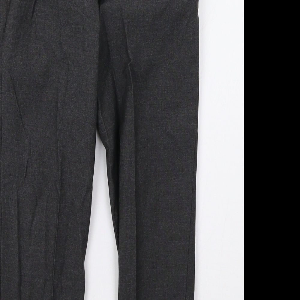 Brand and care label for TU boys’ grey trousers, size 6, years