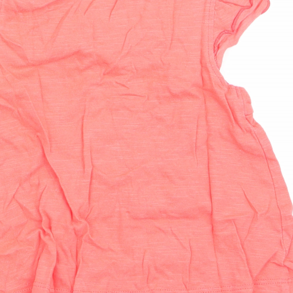 Brand and care label for Nutmeg girls’ orange floral a-line, size 6-9, months