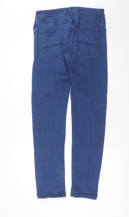 Back view of ASOS women’s blue denim skinny jeans, size UK 32, in, 32-inch leg