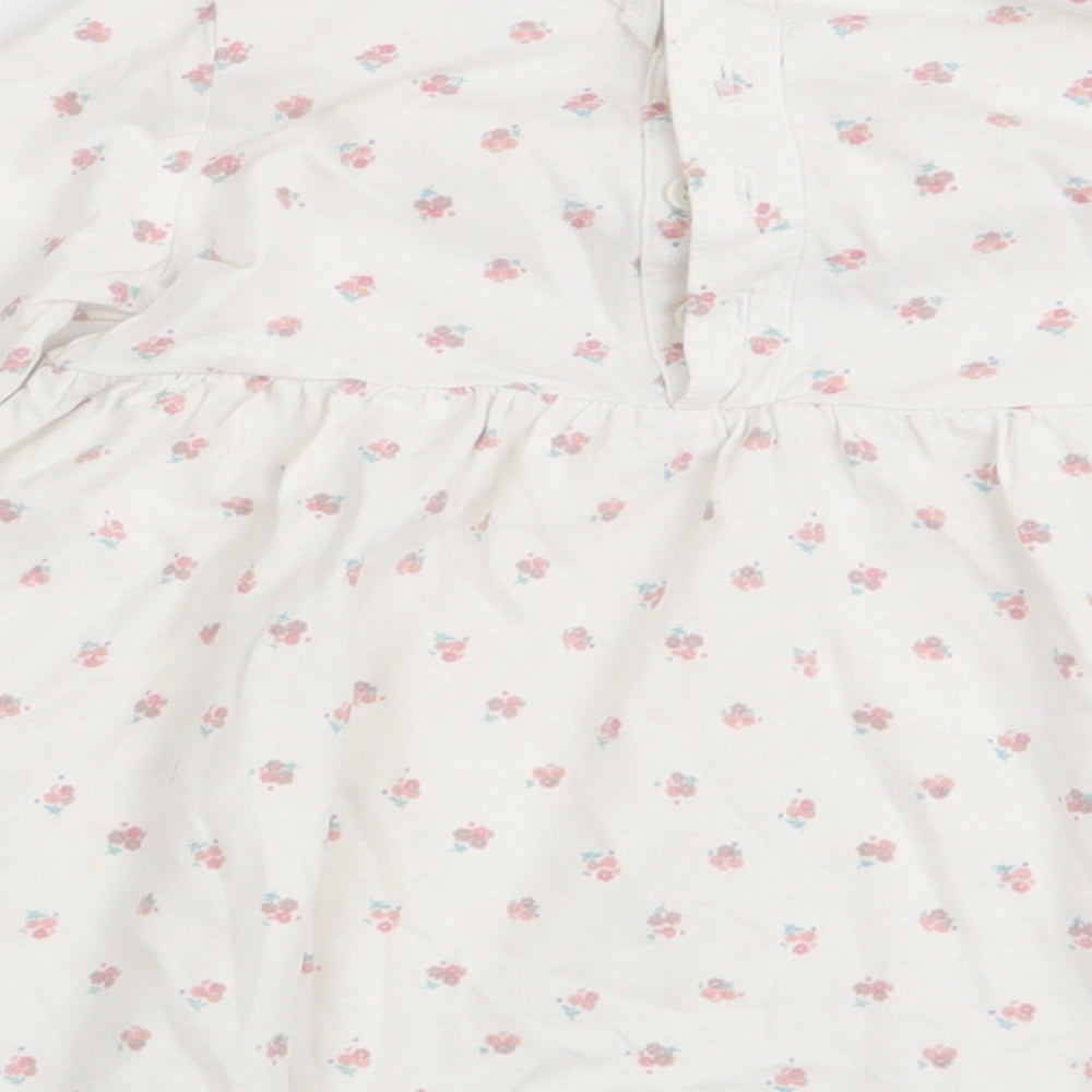 Brand and care label for Matalan girls’ multicoloured floral fit & flare, size 6-9, months