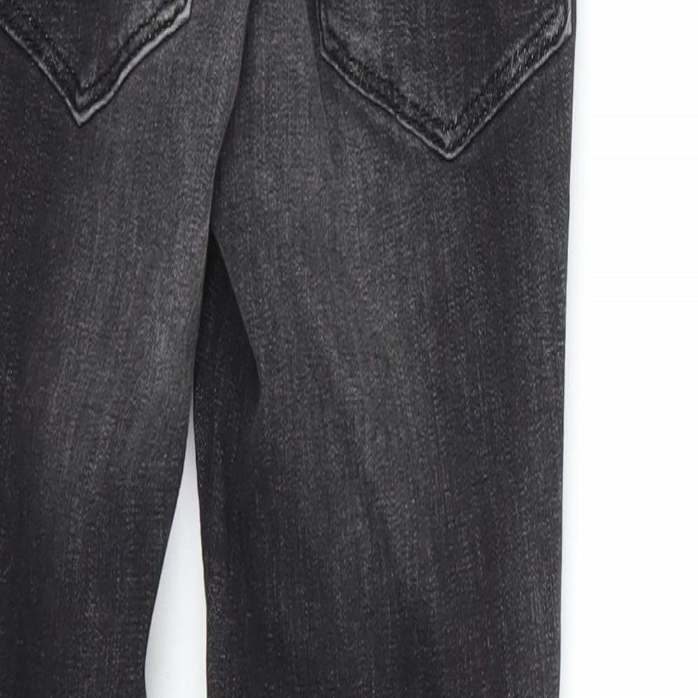 Brand and care label for Next boys’ black denim skinny jeans, size 9, months