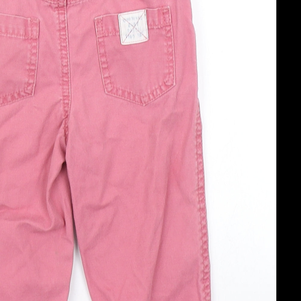 Brand and care label for Pumpkin Patch girls’ pink pedal pusher trousers, size 3-6, months