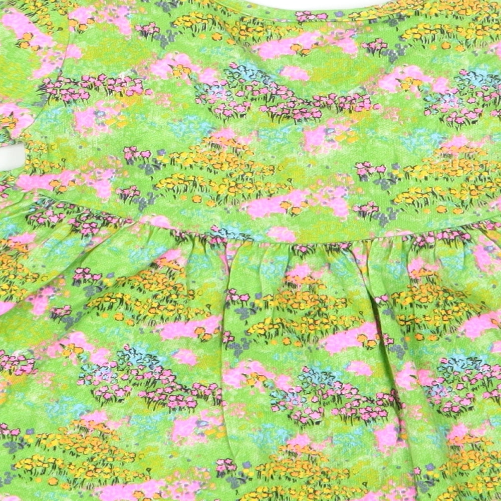 Brand and care label for Next girls’ green floral fit & flare, size 3-6, months