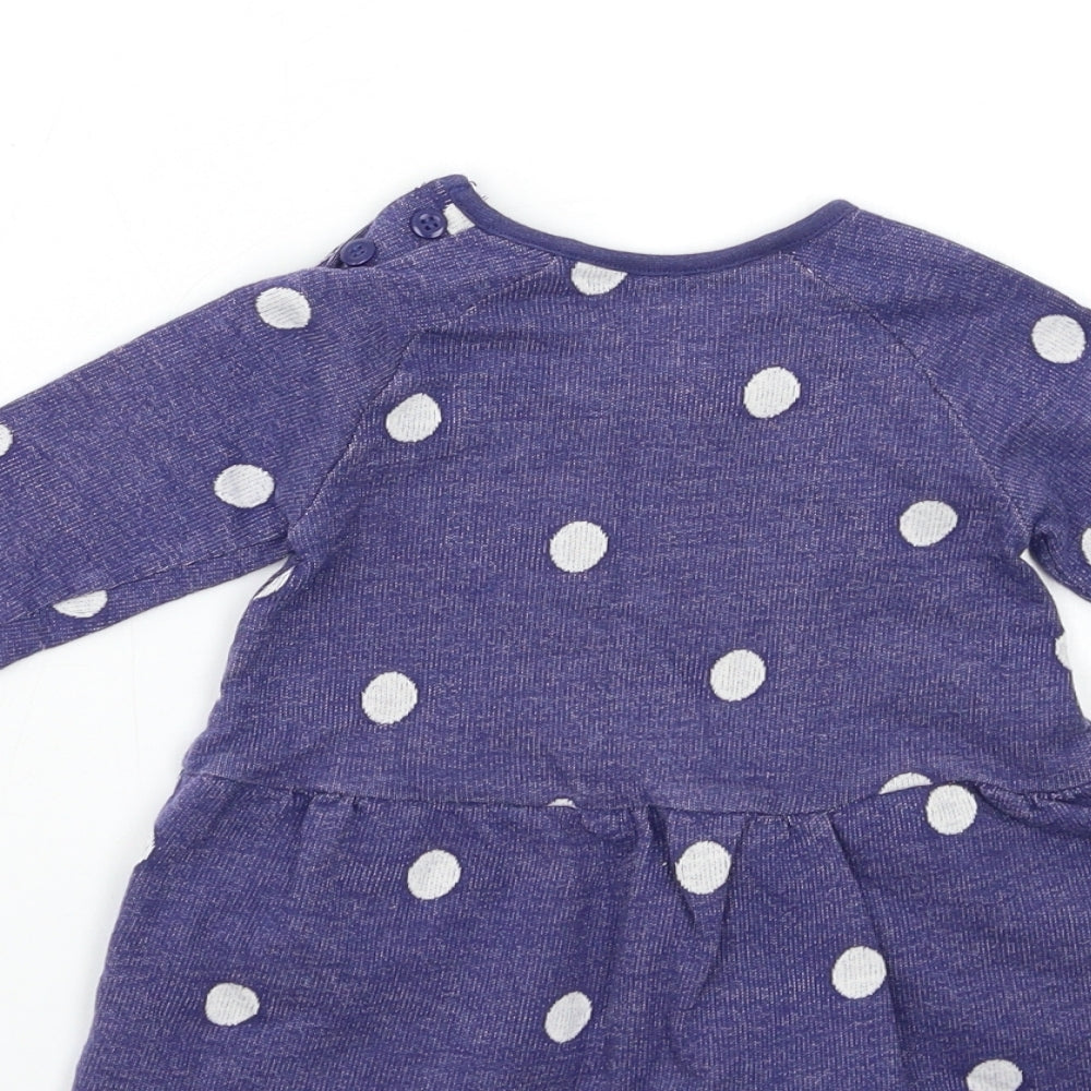Brand and care label for Nutmeg Baby Blue Polka Dot A-Line, size 3-6, Months