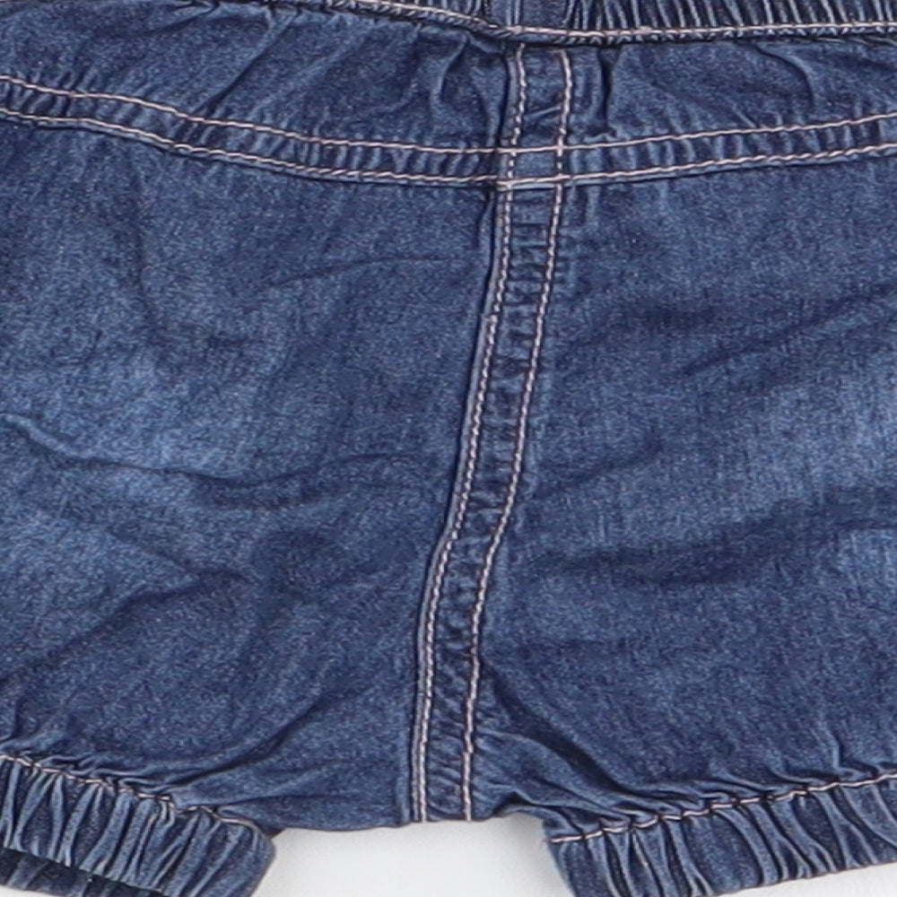 Brand and care label for Nutmeg girls’ blue capri trousers, size 6-9, months - shorts
