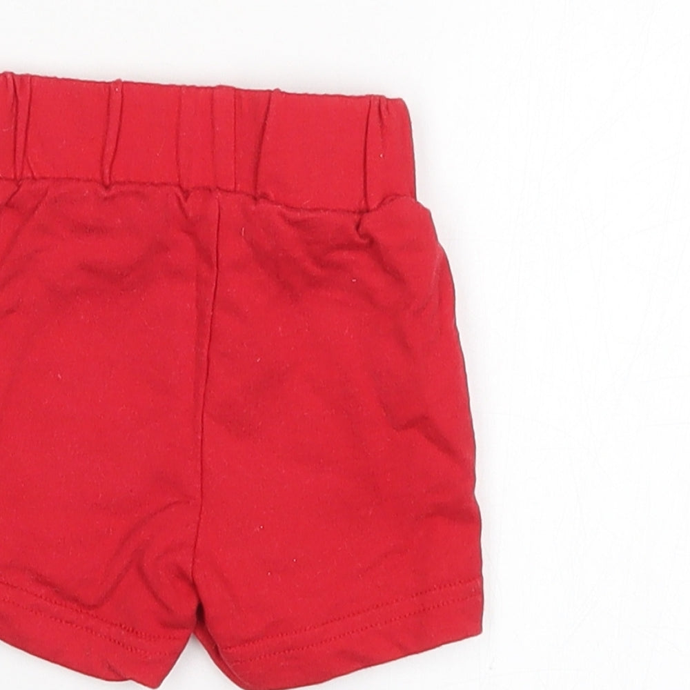 Brand and care label for Disney Baby Red Cropped Trousers, size 0-3, Months