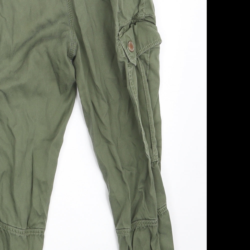 Brand and care label for Next boys’ green cargo trousers, size 9, months