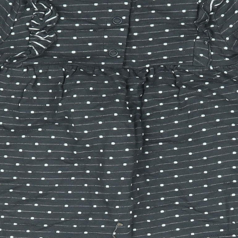 Brand and care label for George girls’ grey polka dot a-line, size 3-6, months