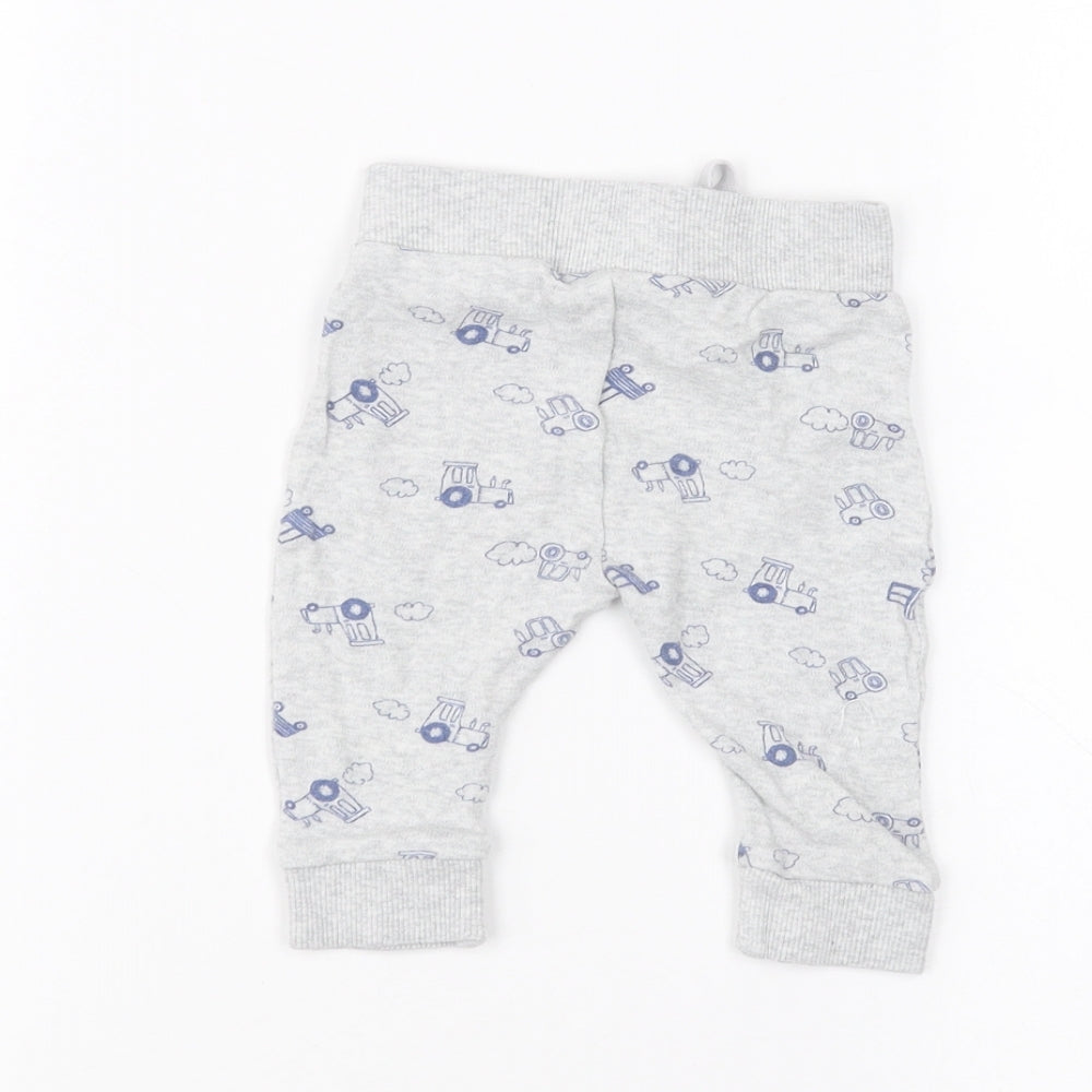 Brand and care label for Mothercare Baby Grey sweatpants, size 3-6, Months