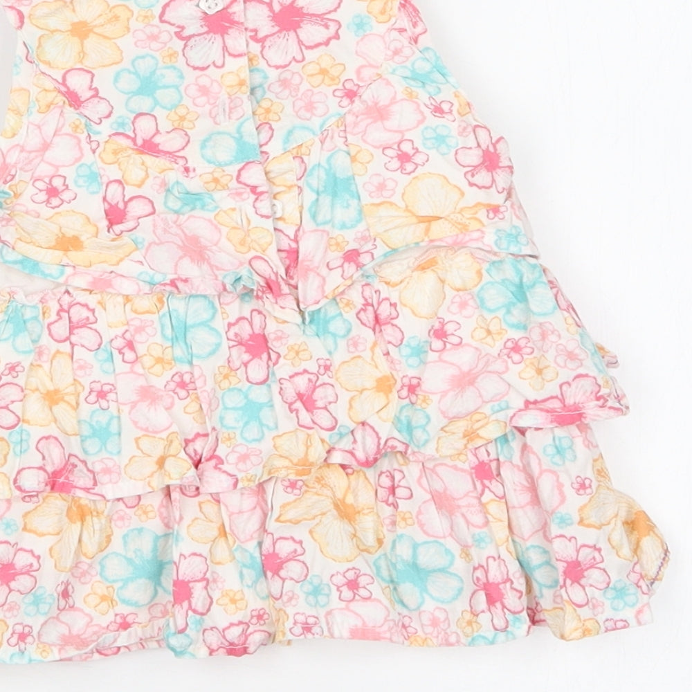 Brand and care label for Mothercare girls’ multicoloured floral basic t-shirt, size 3-6, months