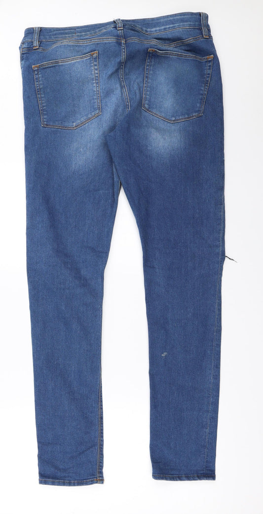 Back view of ASOS women’s blue skinny jeans, size UK 34, in, 32-inch leg