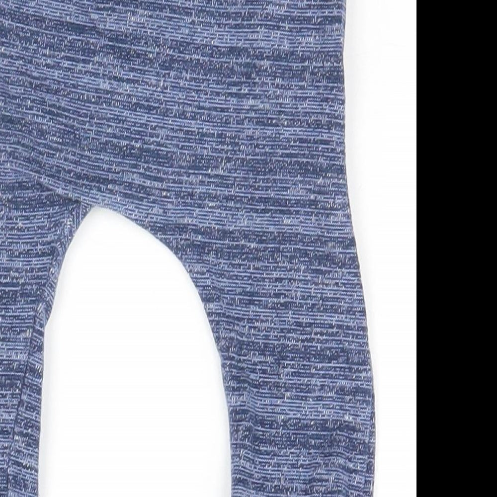 Brand and care label for Mini Club Baby Blue Striped sweatpants, size 9-12, Months