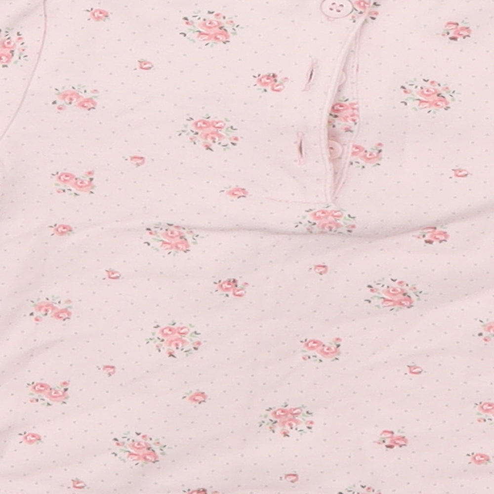 Brand and care label for Mini Club girls’ pink floral basic dress shirt, size 6-9, months