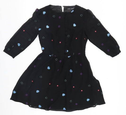 Additional front view of Love Label women’s black geometric a-line, size UK 8, - hearts