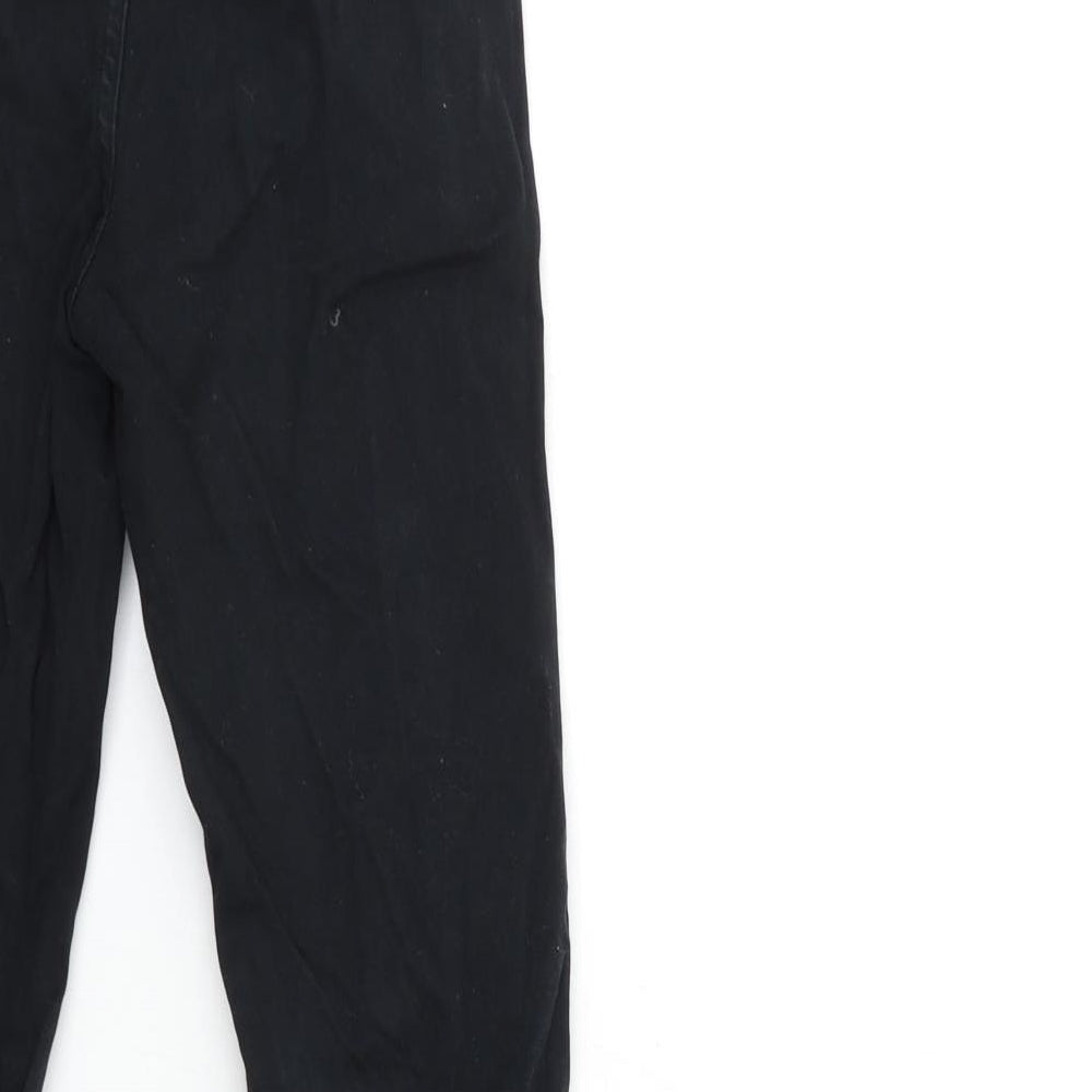 Brand and care label for Next boys’ black chino trousers, size 9, months