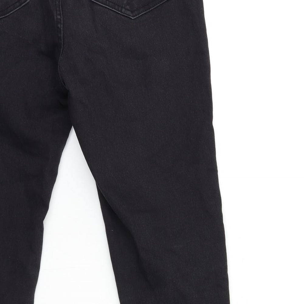 Brand and care label for Boohoo women’s black denim skinny jeans, size UK 10, 28.5-inch leg