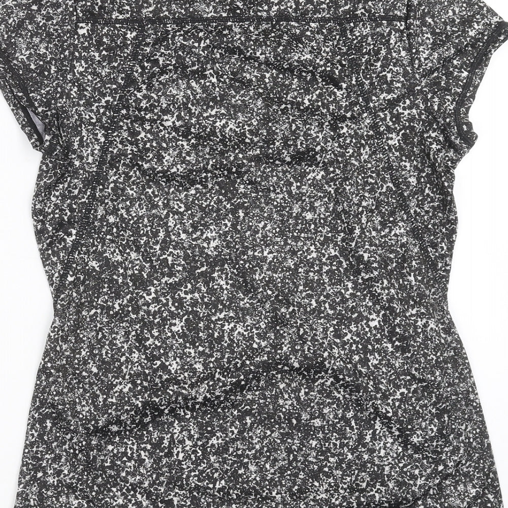 Brand and care label for Athletic Works women’s black basic t-shirt, size S