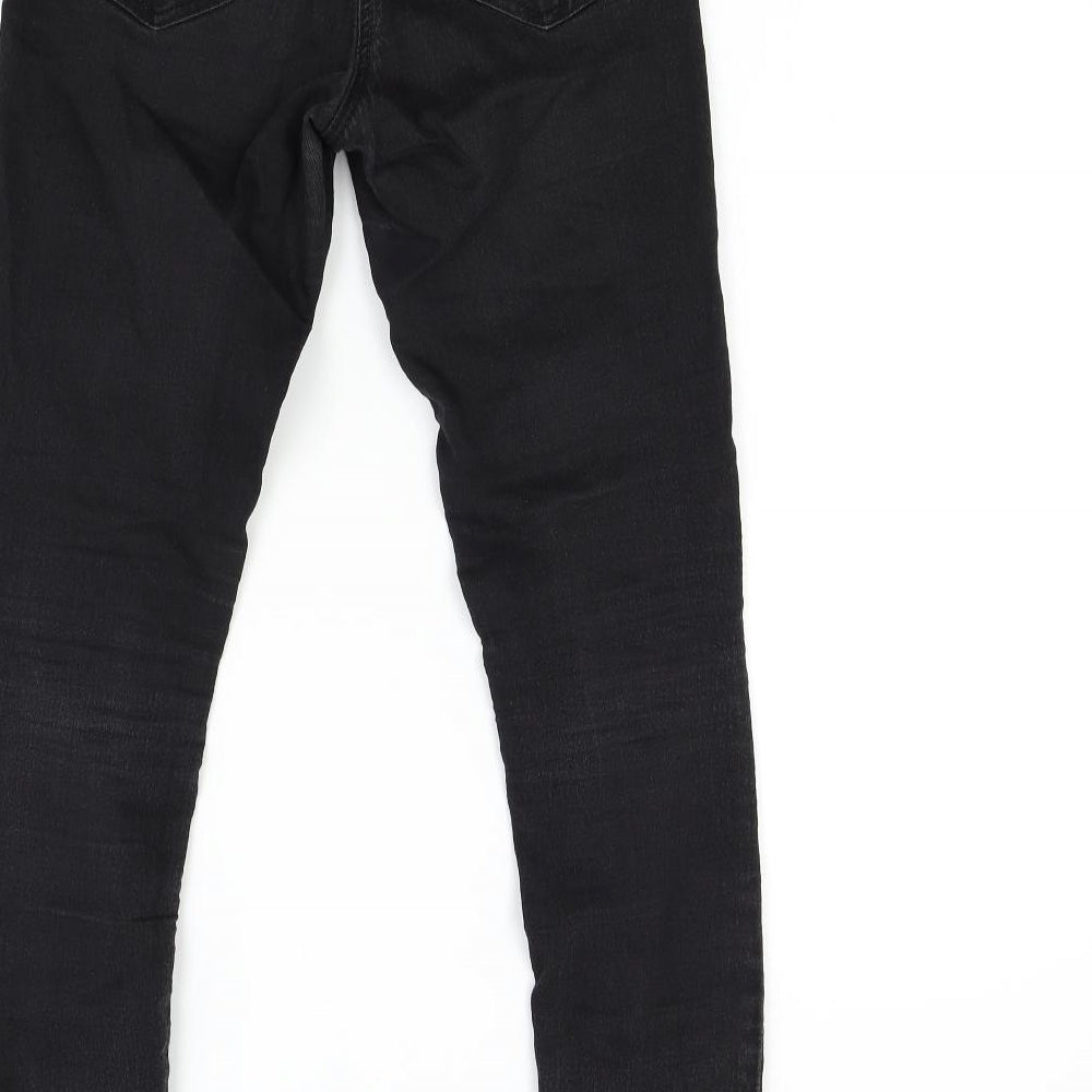 Brand and care label for Tu women’s black denim skinny jeans, size UK 8, 29-inch leg
