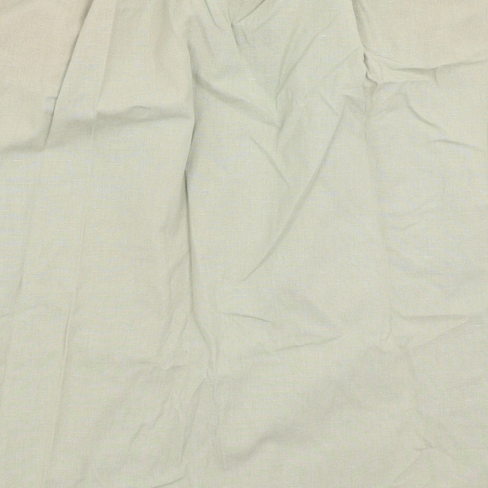 Brand and care label for Akal women’s green a-line skirt, size L