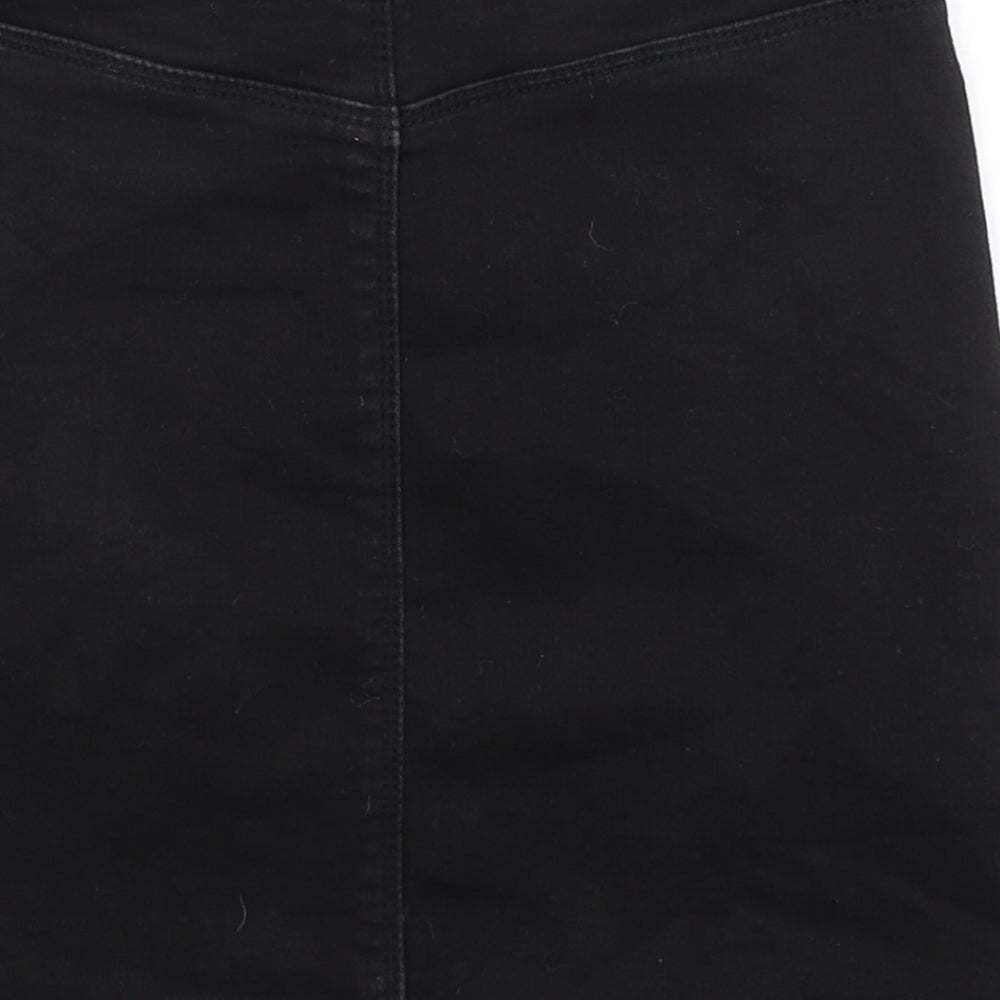 Brand and care label for Missguided women’s black a-line skirt, size UK 8