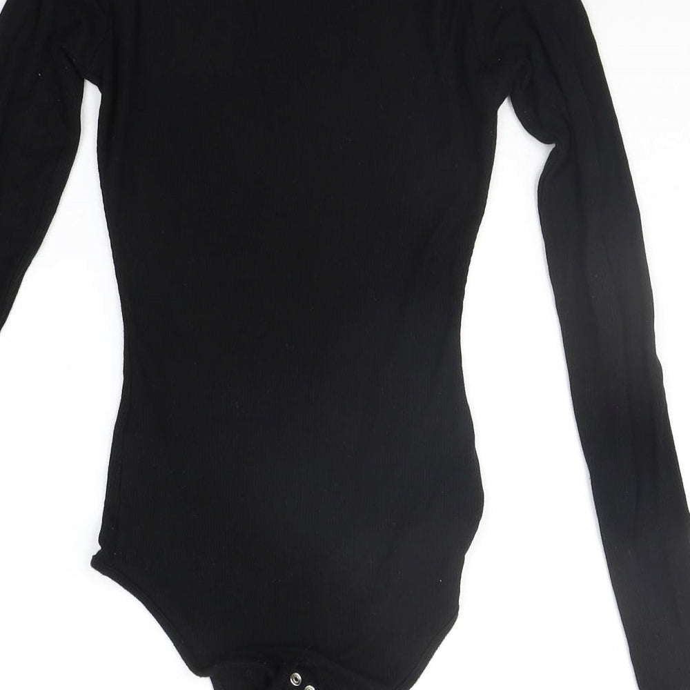 Brand and care label for Primark women’s black jumpsuit one-piece size 2xs