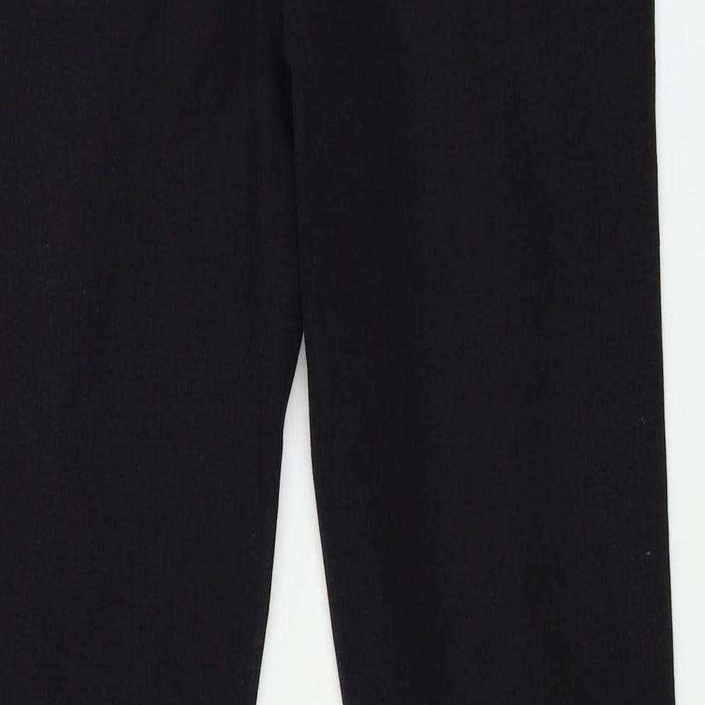 Brand and care label for Boohoo women’s black skinny jeans, size UK 32, in, 27-inch leg
