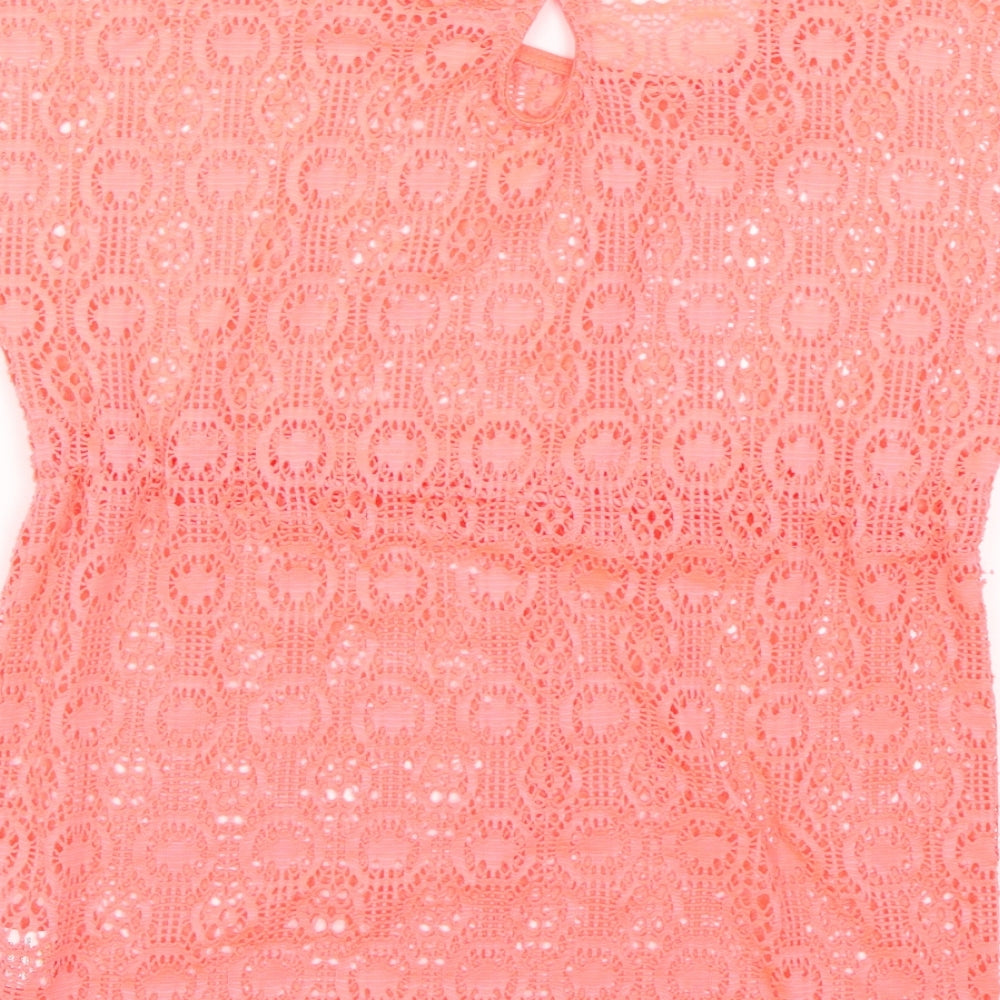 Brand and care label for Matalan girls’ orange basic t-shirt, size 10, years