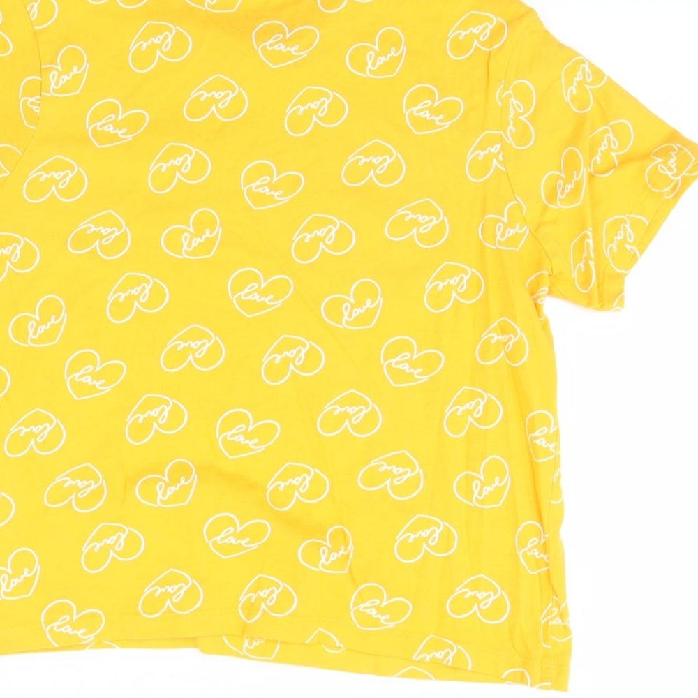 Brand and care label for Primark women’s yellow cropped t-shirt, size S