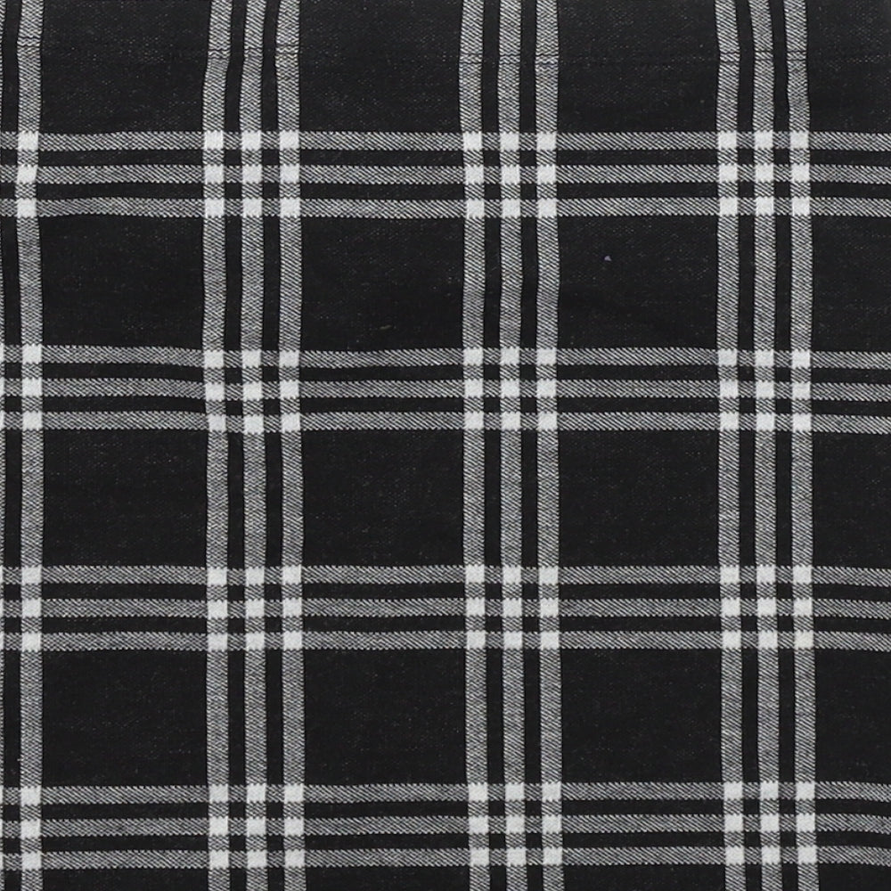 Brand and care label for Miss E-vie girls’ black check jersey a-line skirt, size 10-11, years