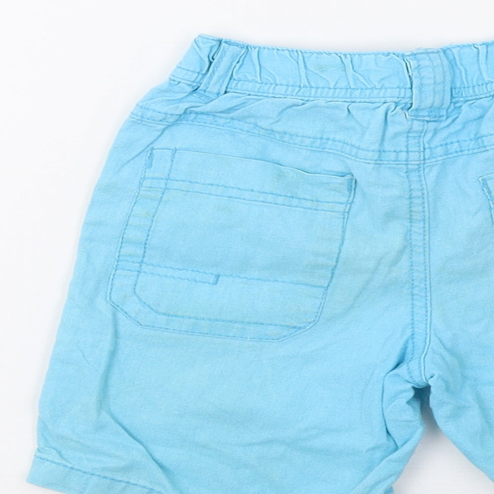 Brand and care label for Urban Rascals boys’ blue bermuda shorts, size 2-3, years