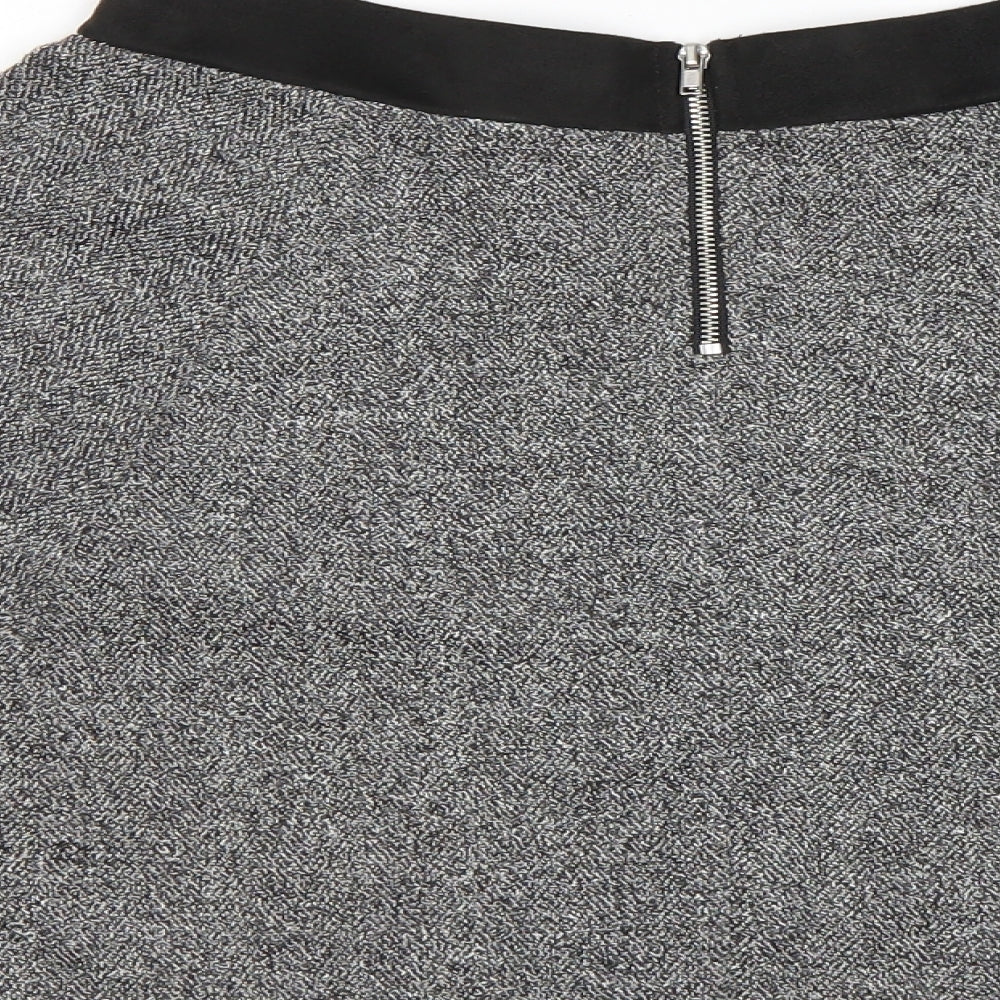 Brand and care label for H&M women’s grey skater skirt, size S