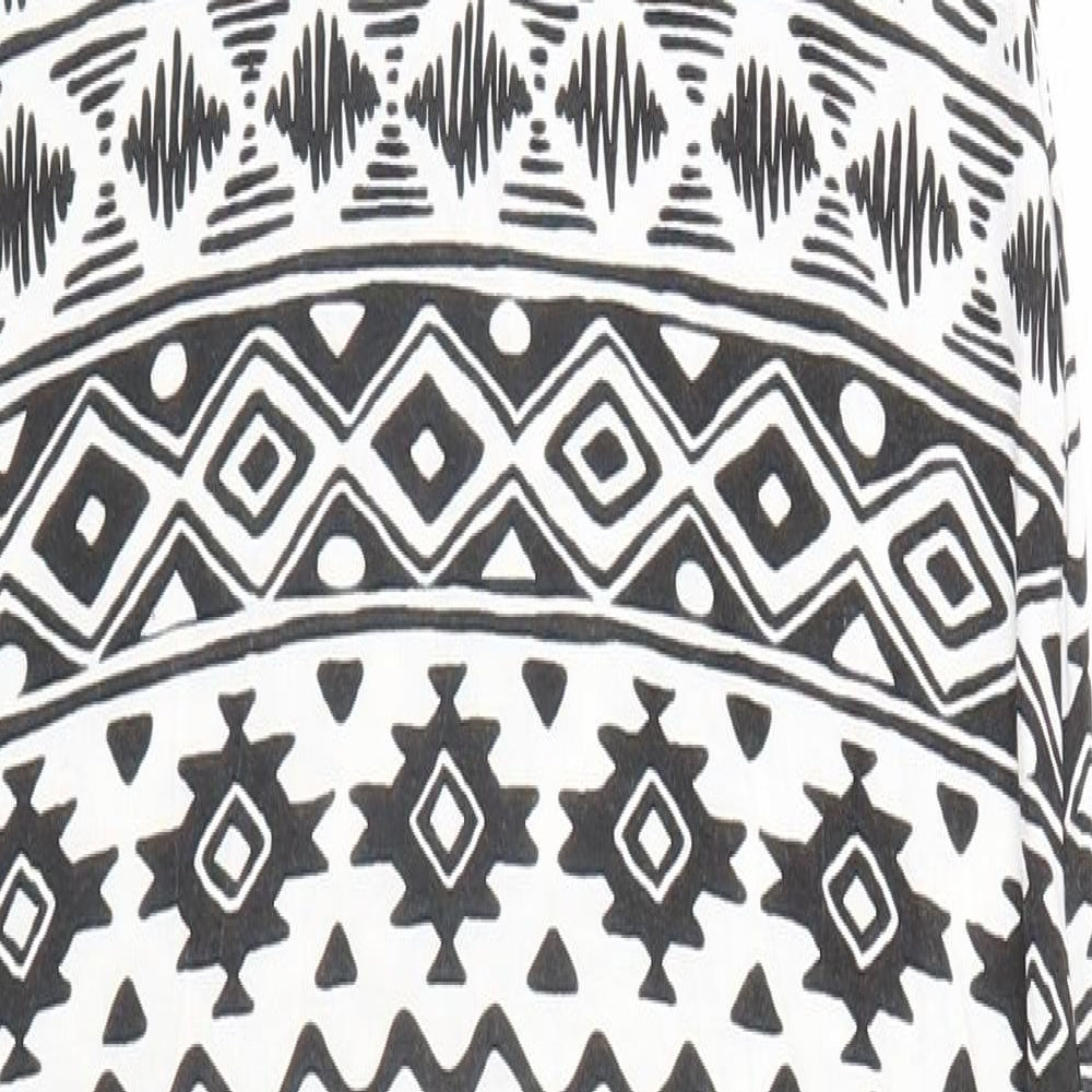 Brand and care label for Boohoo women’s white geometric pencil dress