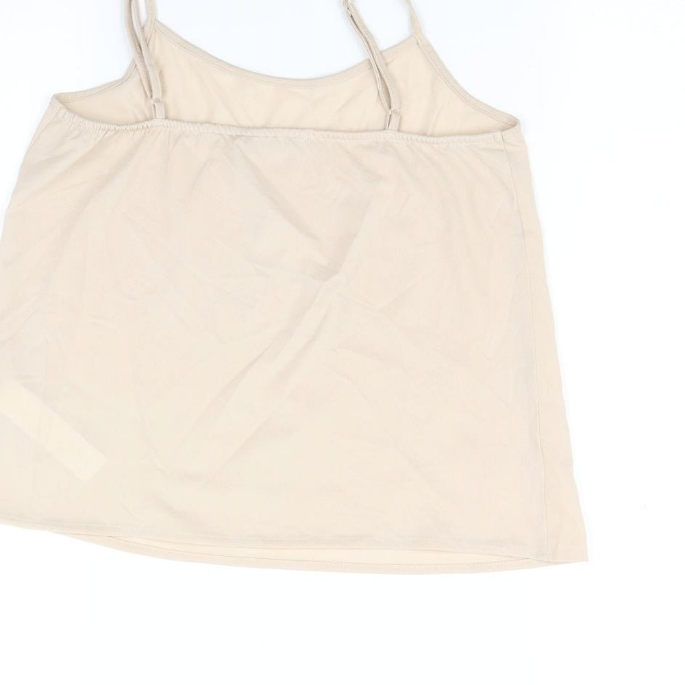 Brand and care label for Marks & Spencer girls’ beige camisole t-shirt, size 11-12, years