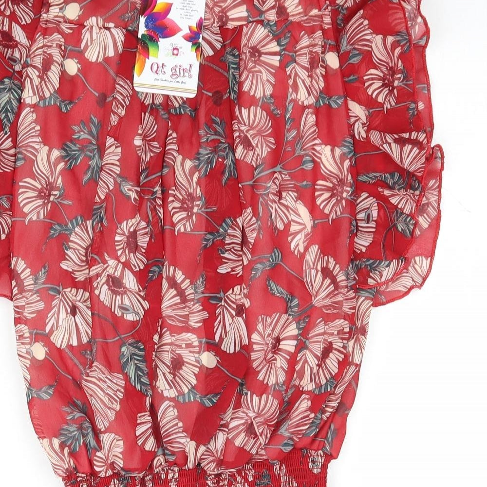 Brand and care label for Qt girl girls’ red floral basic blouse one size