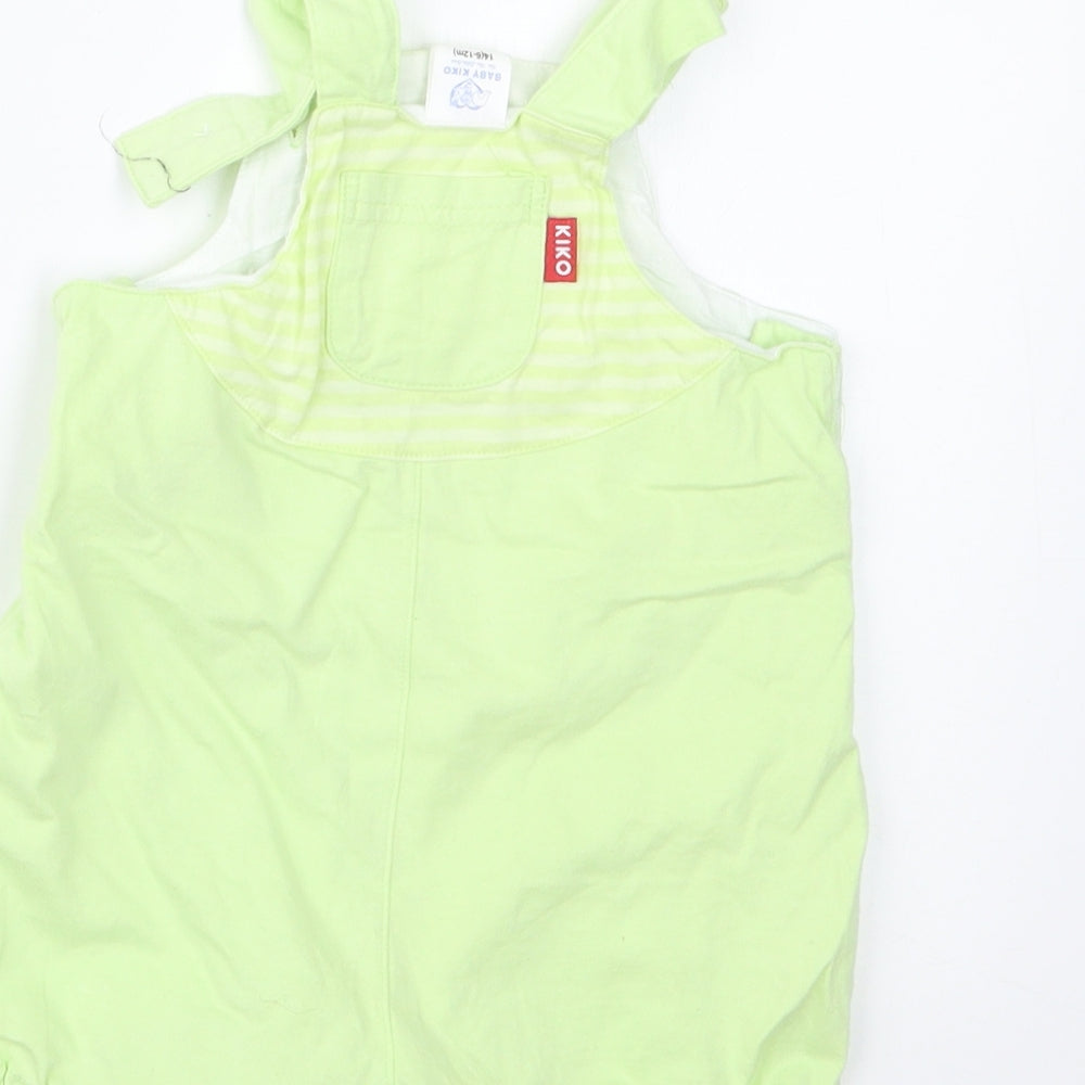 Brand and care label for Baby Kiko girls’ green dungaree outfit/set, size 6-9, months