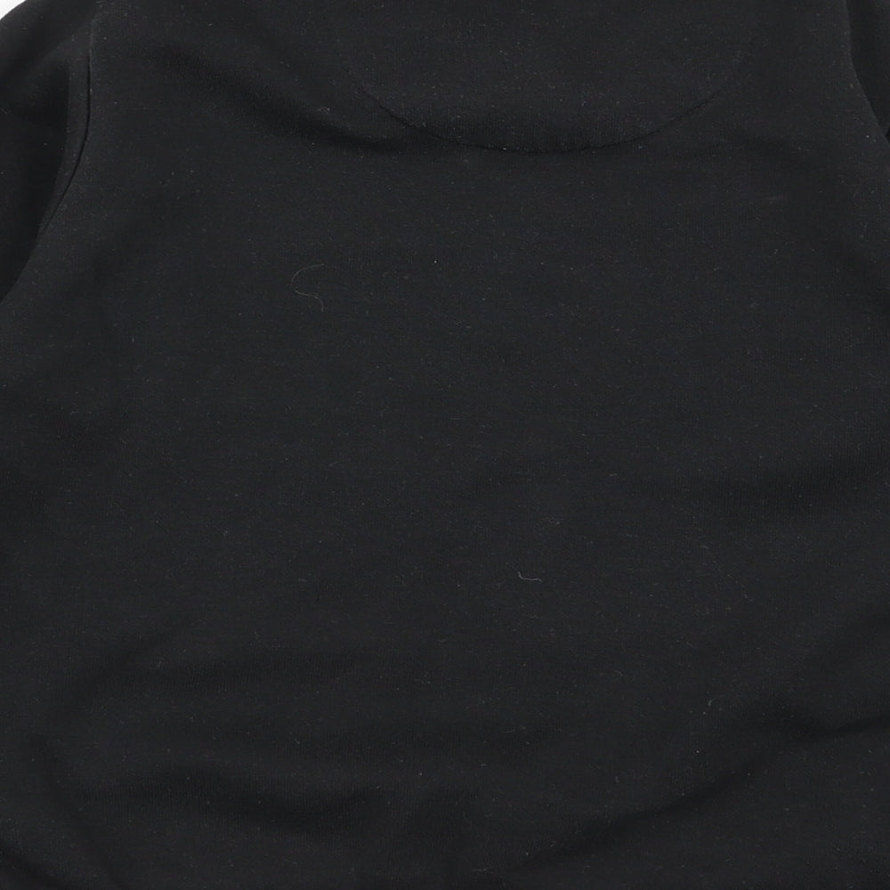 Brand and care label for Primark girls’ black jumper, size 6-7, years