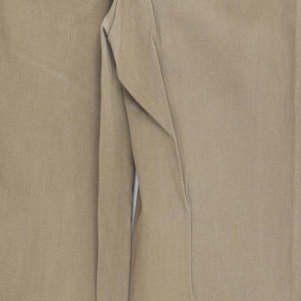 Brand and care label for Wolsey men’s beige straight jeans, size 34, in, 30-inch leg
