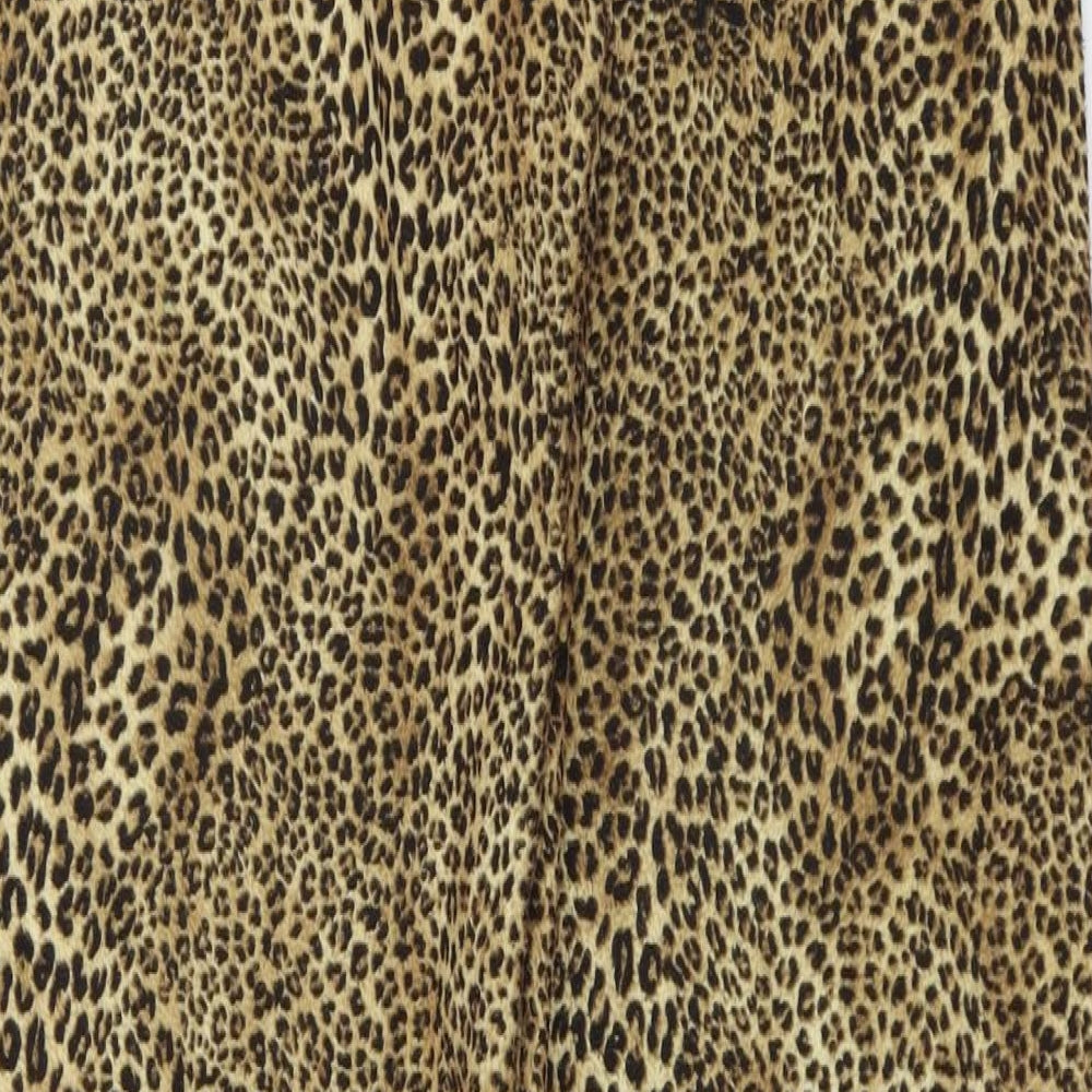 Brand and care label for Preworn women’s beige animal print sweatpants, size UK 30, in, 27-inch leg