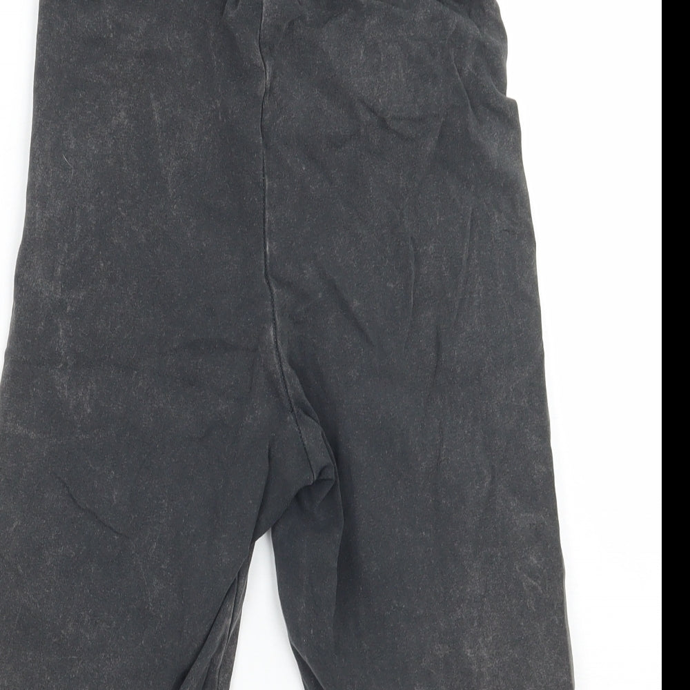 Brand and care label for Tiopshop women’s grey sweat shorts, size UK 6