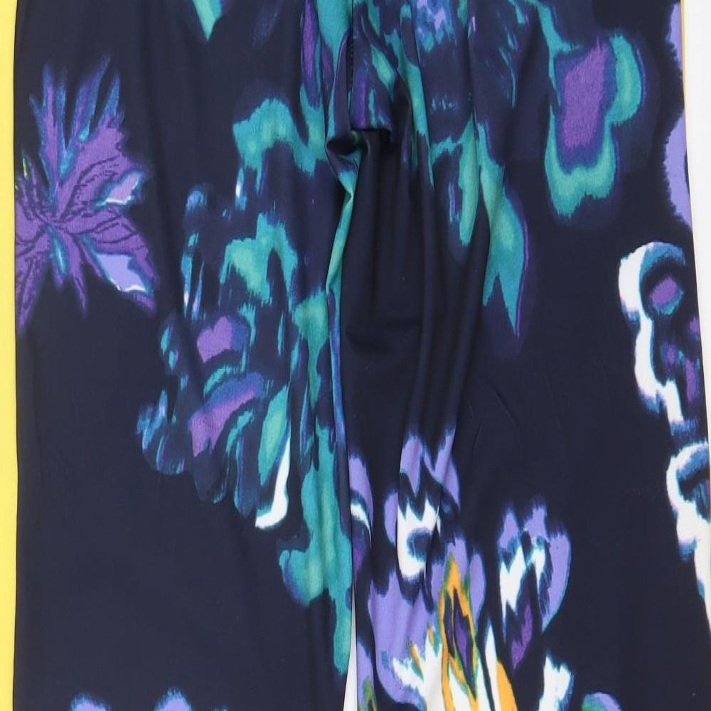 Brand and care label for NICK VERSE women’s multicoloured floral trousers, size XS, 30-inch leg
