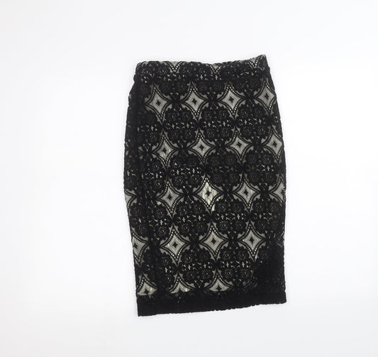 Back view of F&F women’s black peasant skirt, size UK 6