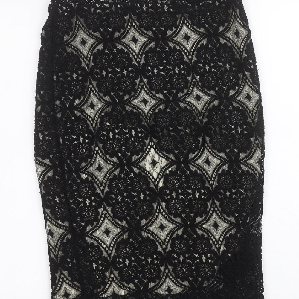 Brand and care label for F&F women’s black peasant skirt, size UK 6
