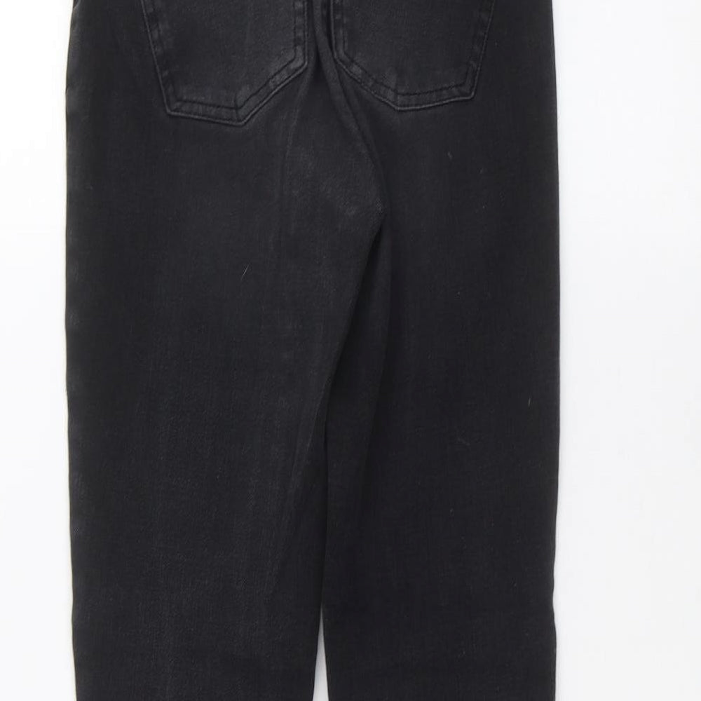 Brand and care label for Next women’s black skinny jeans, size UK 8, 25-inch leg