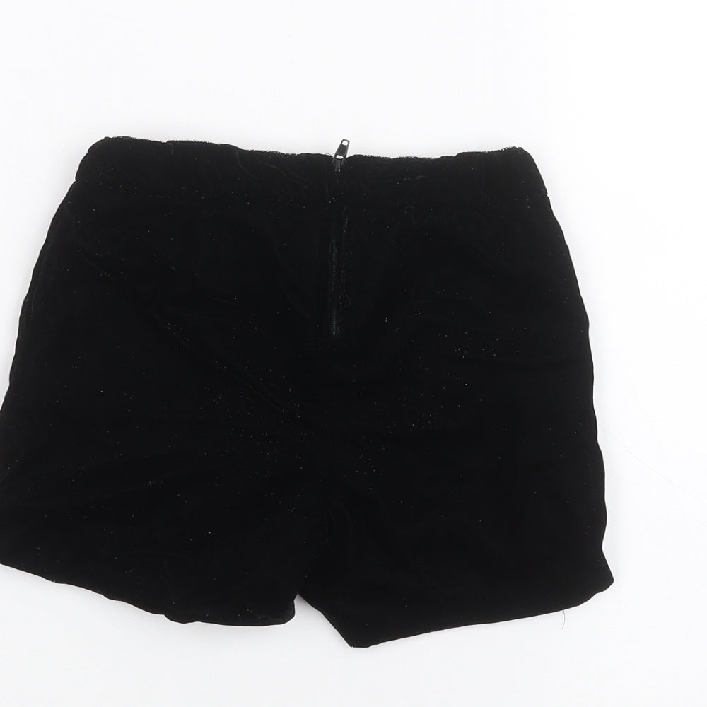 Brand and care label for H&M girls’ black sweat shorts, size 5-6, years