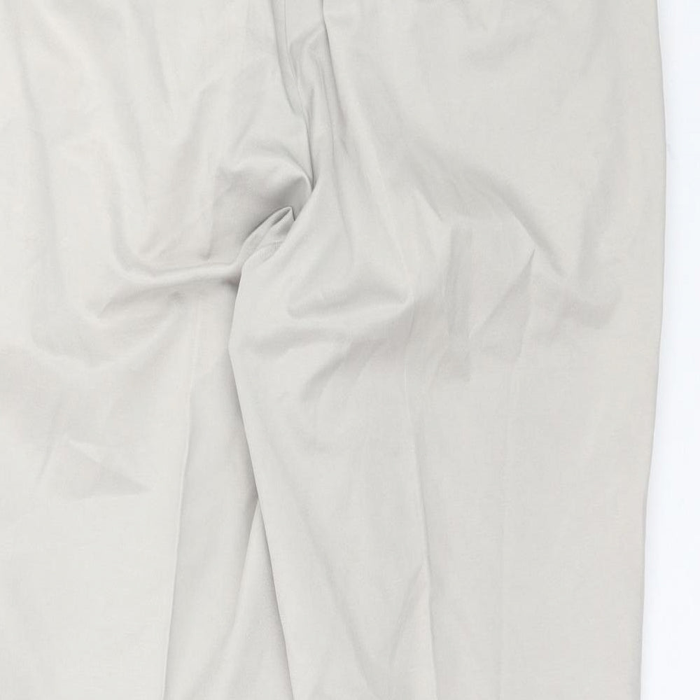 Brand and care label for G2000 MAN men’s beige trousers, size 34, 28-inch leg