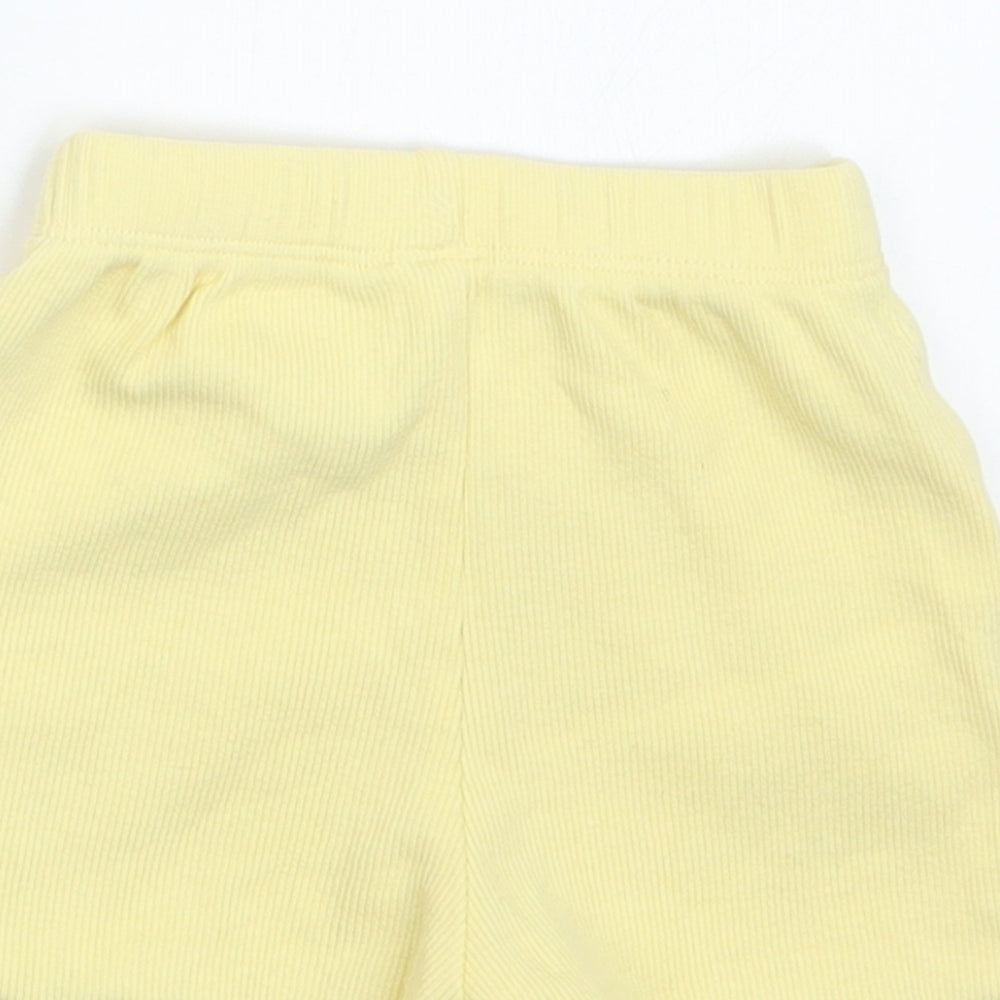 Brand and care label for George girls’ yellow cropped trousers, size 3-6, months