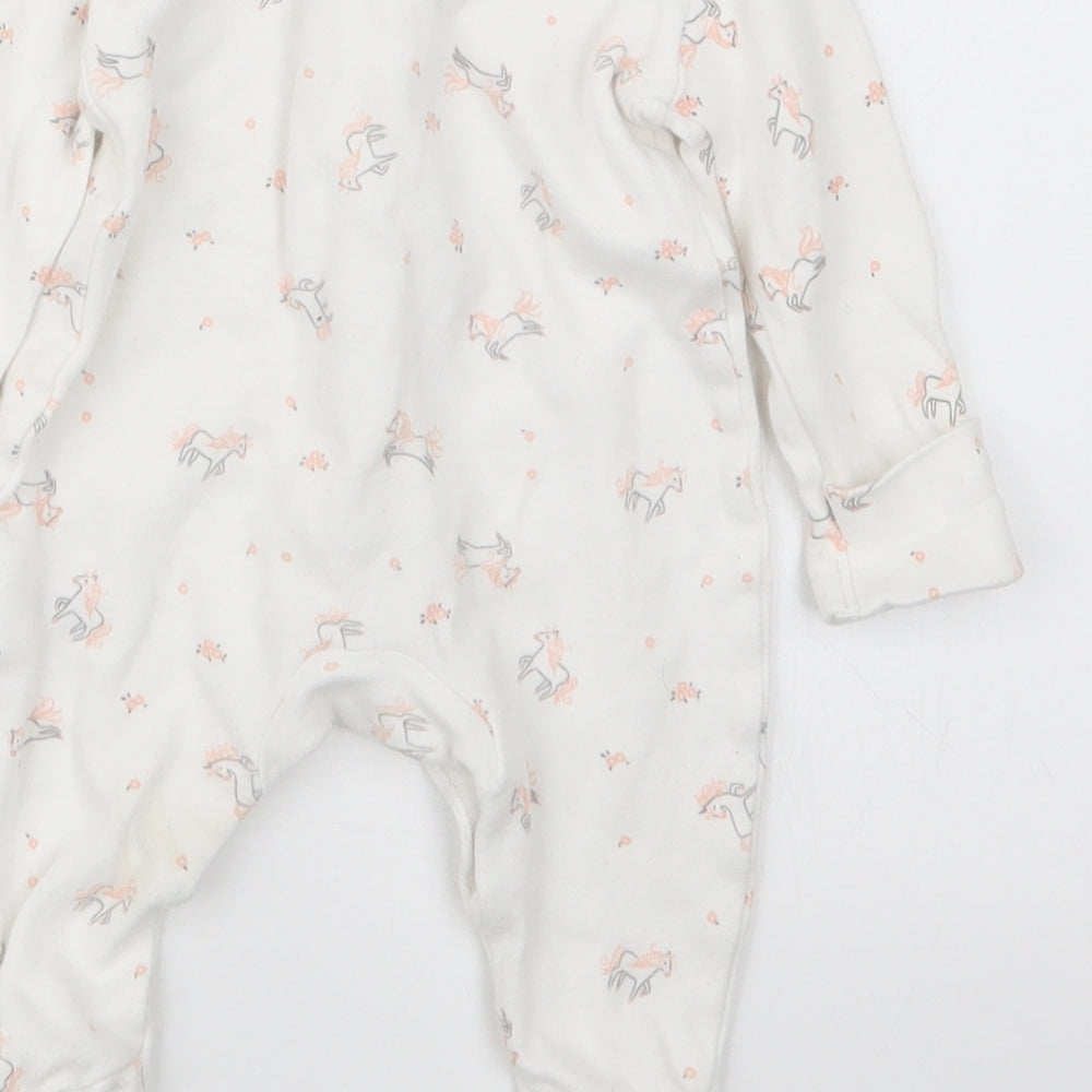 Brand and care label for George girls’ pink geometric babydoll one piece size newborn