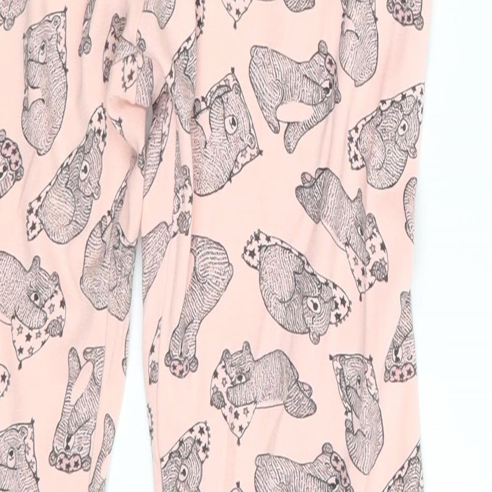 Brand and care label for George girls’ pink animal print sweatpants, size 11-12, years