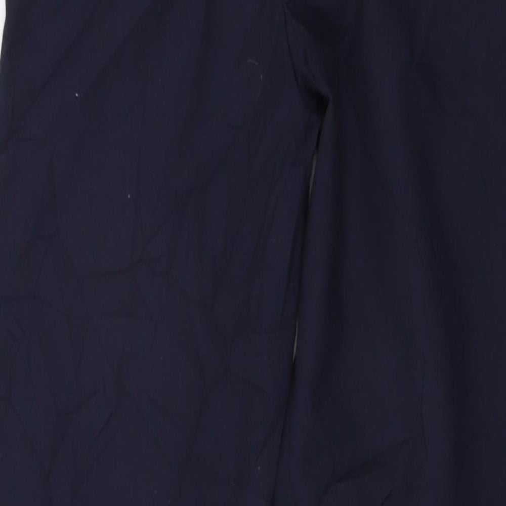 Brand and care label for Tu girls’ blue dress pants trousers, size 12, years