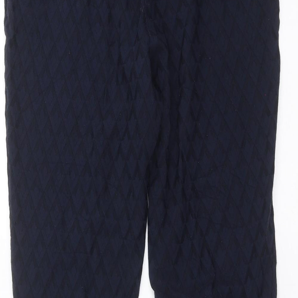 Brand and care label for Tu women’s blue geometric trousers, size UK 10, 27-inch leg